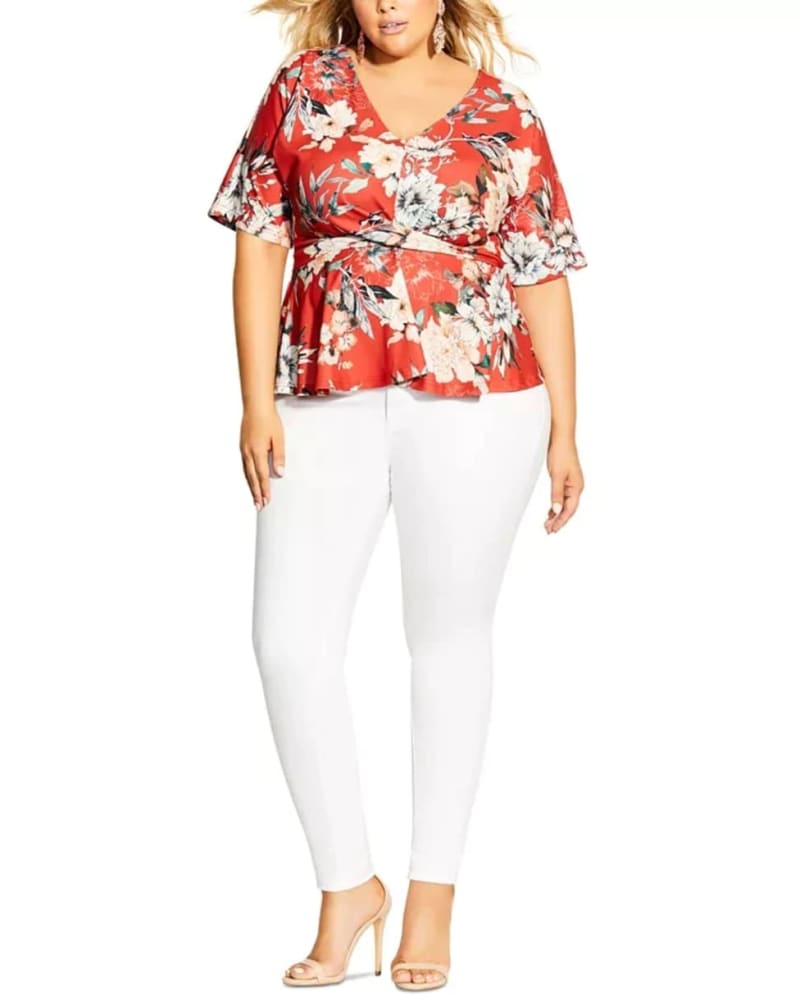 Front of a model wearing a size 22W City Chic Women's Trendy Plus Size Printed Twist-Front Top Dark Orange Size 22W in Orange by City Chic. | dia_product_style_image_id:311369